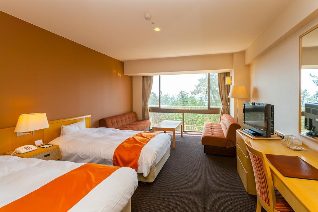 Suzu Beach Hotel Quarto foto